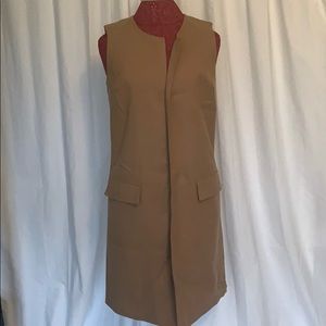 Sleeveless knee length brown vest